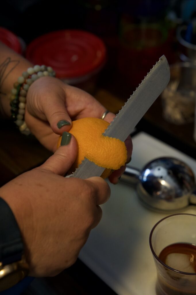 cutting a twist off an orange