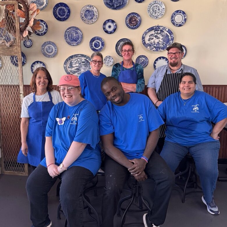 group photo of staff at restaurant