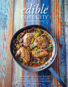 cover of edible port city magazine with a pan of chicken