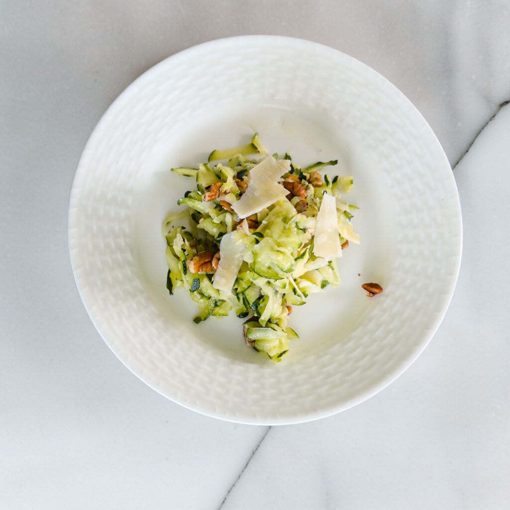 Shredded zucchini salad with lemon Parmesan cheese and walnuts recipe